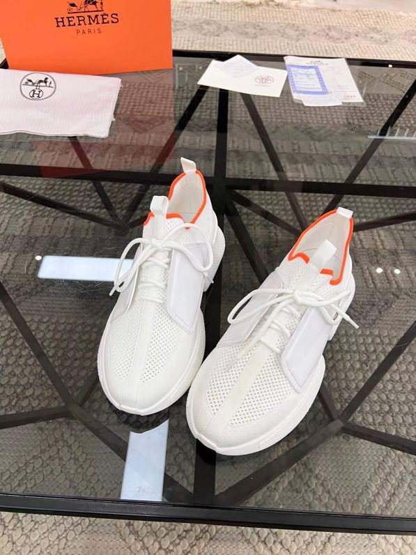 Hermès White Orange Knit Sneakers — front