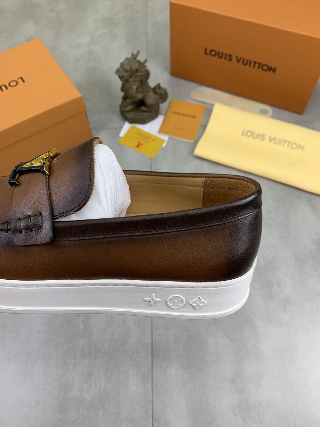 Louis Vuitton Metal Emblem Slip-On Loafers — detail