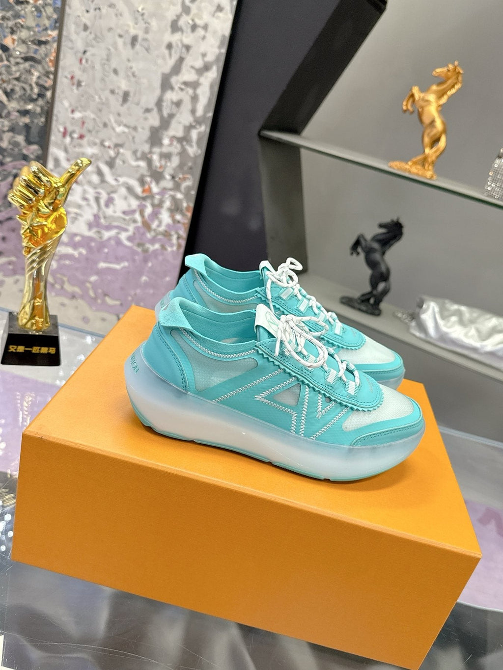 Louis Vuitton Aqua Blue and White Low-Top Sneakers — front