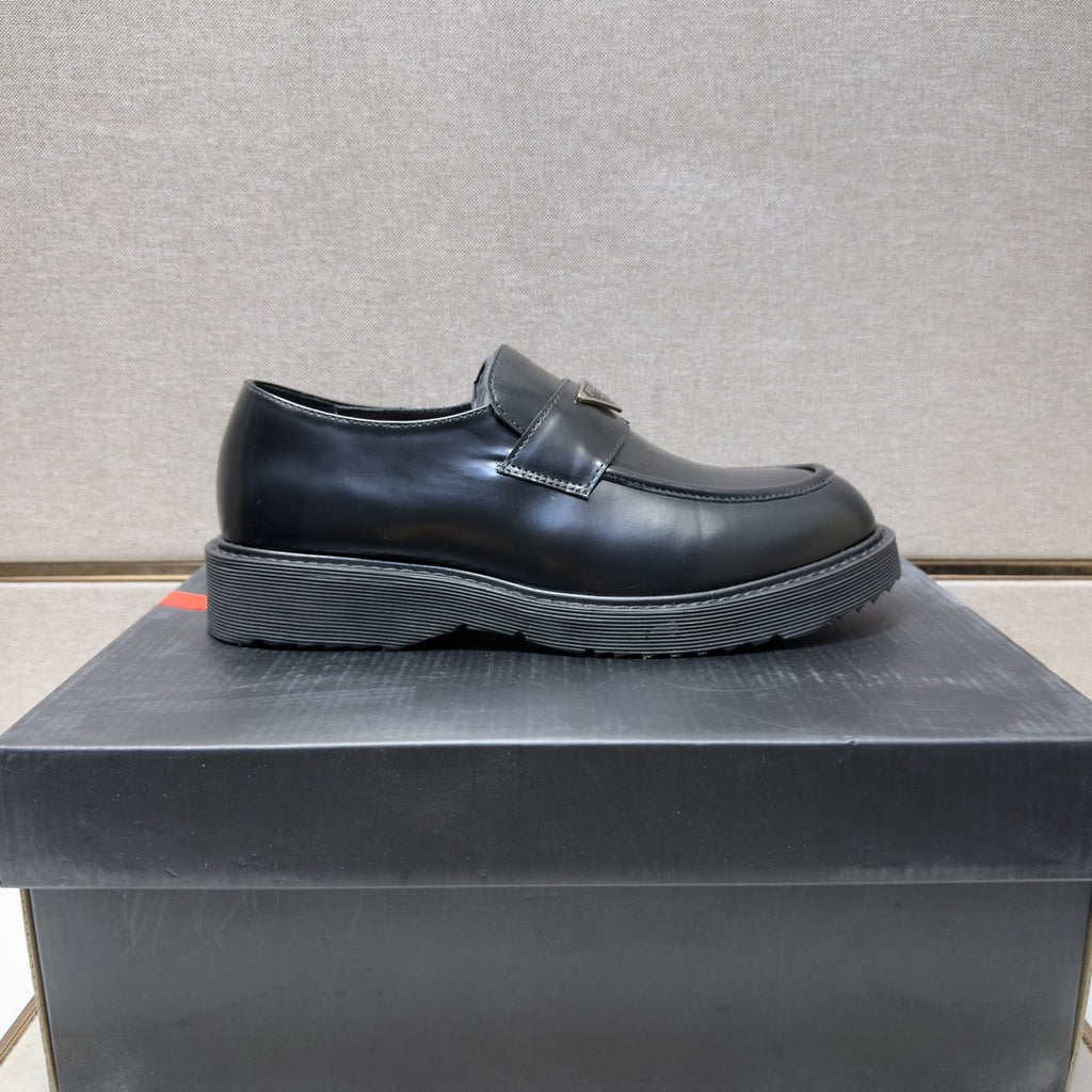 Prada Black Lug Sole Slip-On Shoes — side