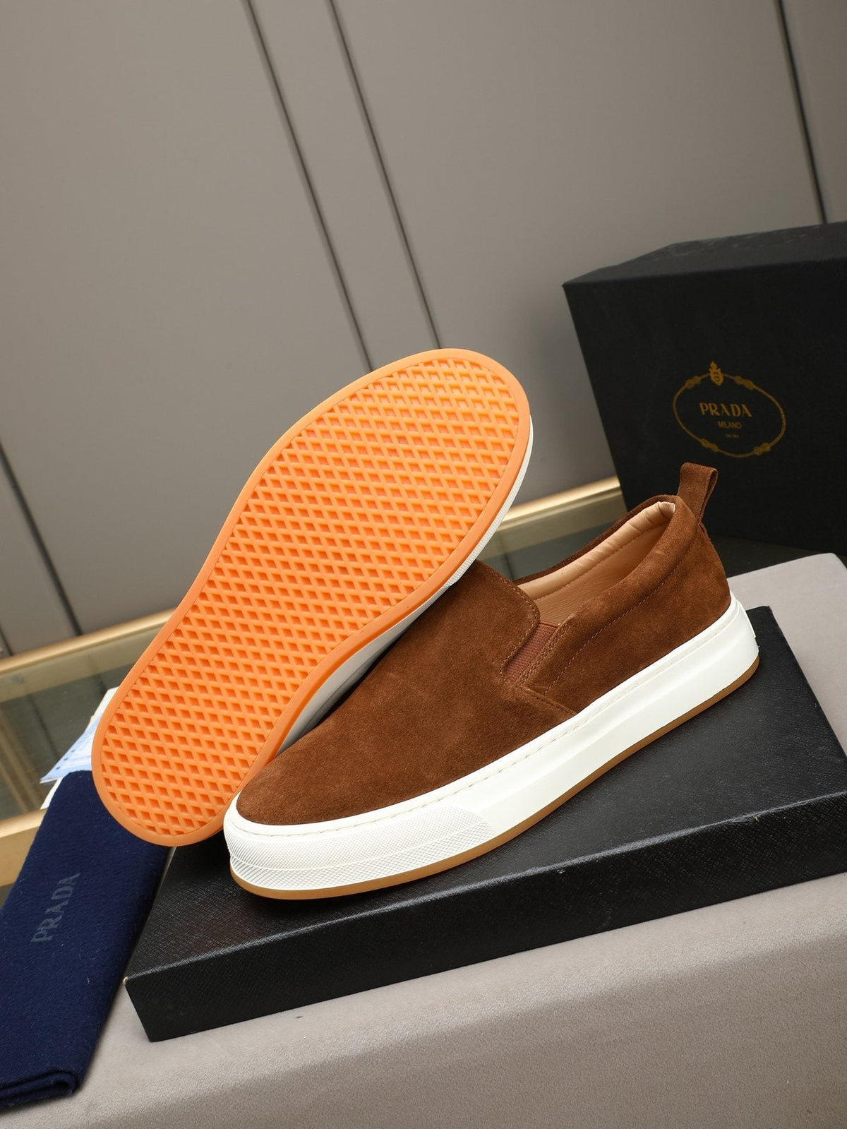Prada Leather Slip-On Sneakers — detail
