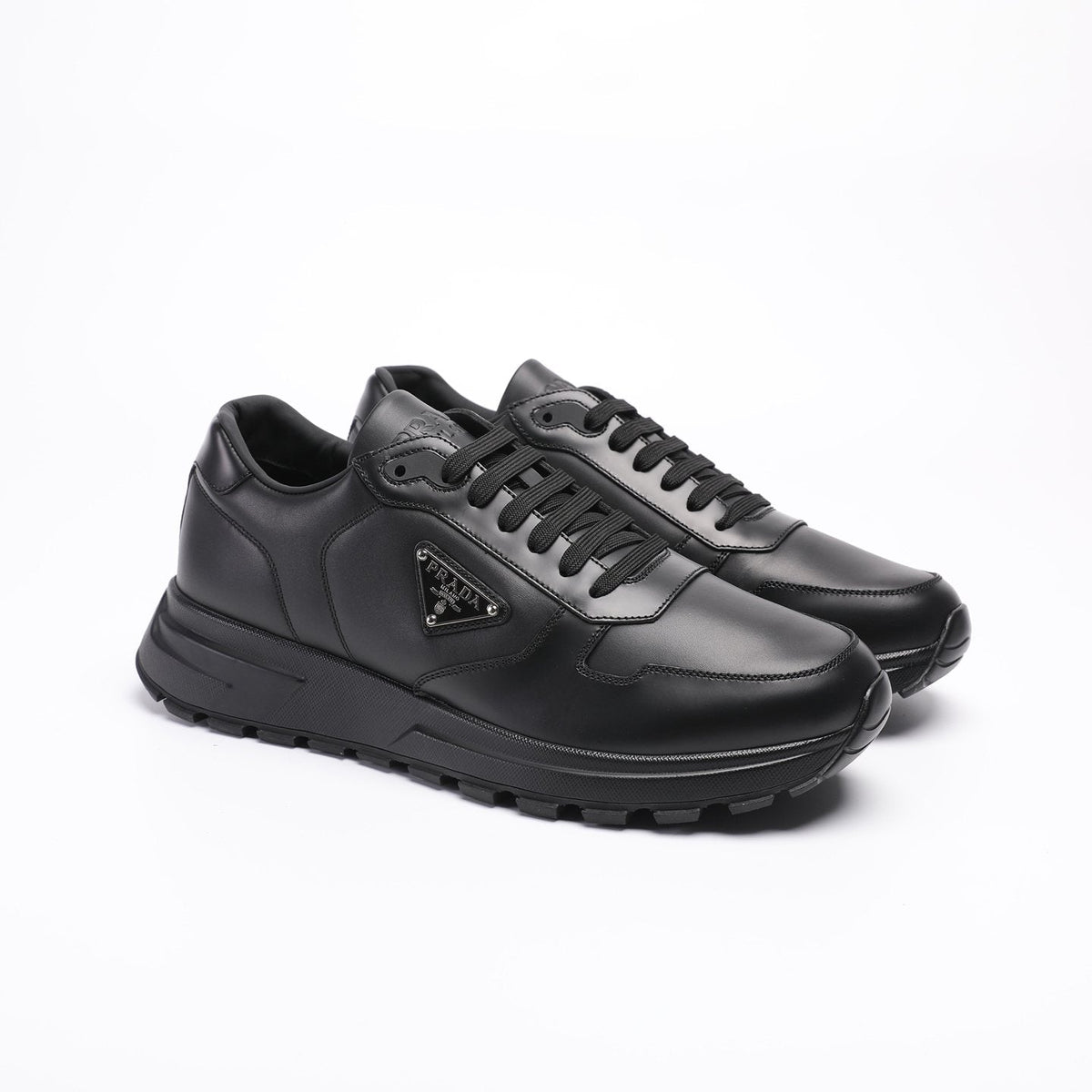 Prada Triangle Plaque Low-Top Sneakers — front