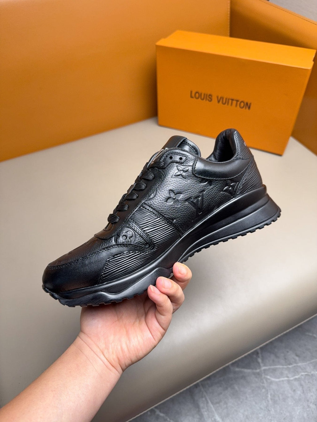 Louis Vuitton Embossed Low-Top Sneakers — side